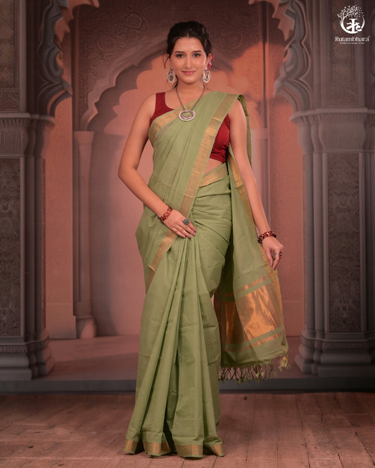 BHADRA - Elegant Pastel green Pure Cotton Saree with Gold Border and Kalamkari Blouse