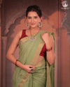 BHADRA - Elegant Pastel green Pure Cotton Saree with Gold Border and Kalamkari Blouse