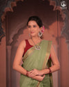 BHADRA - Elegant Pastel green Pure Cotton Saree with Gold Border and Kalamkari Blouse