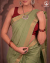 BHADRA - Elegant Pastel green Pure Cotton Saree with Gold Border and Kalamkari Blouse
