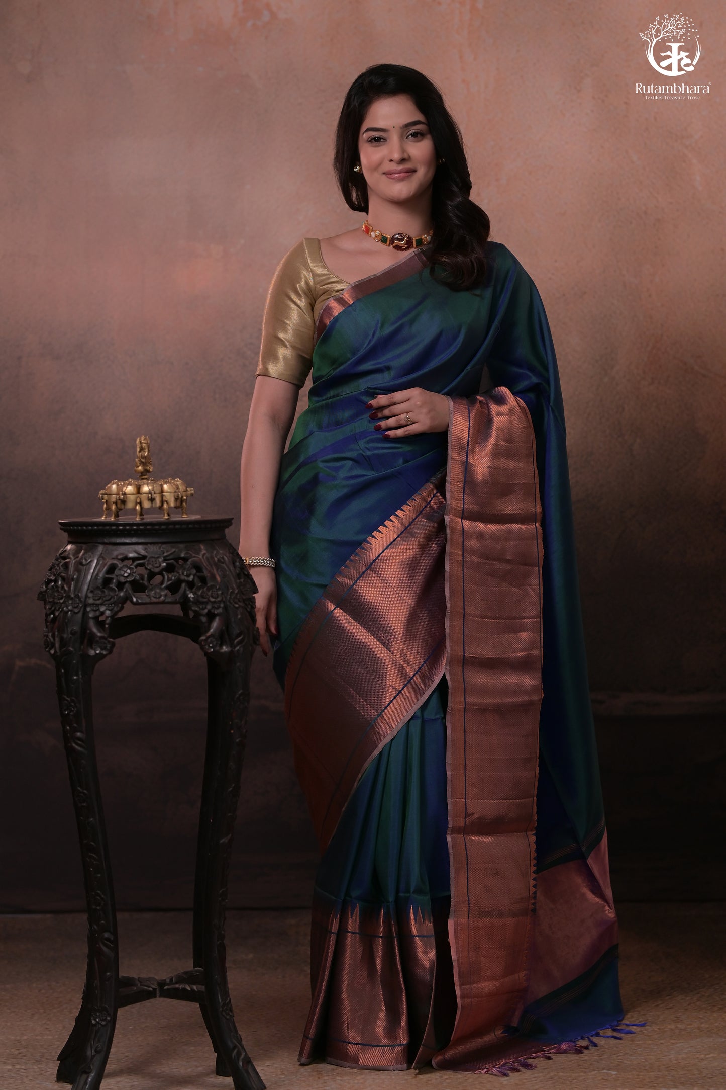 Bhadra - Teal Blue Plain Handwoven Silk Saree With Copper Zari Border