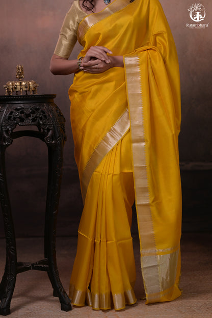 Bhadra - Turmeric Yellow Plain Handwoven Silk Saree With Silver Zari Border-Rutambhara-RUTAMBHARA