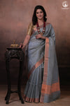 Bhadra - Powder Blue Plain Handwoven Silk Saree With Copper Zari Border