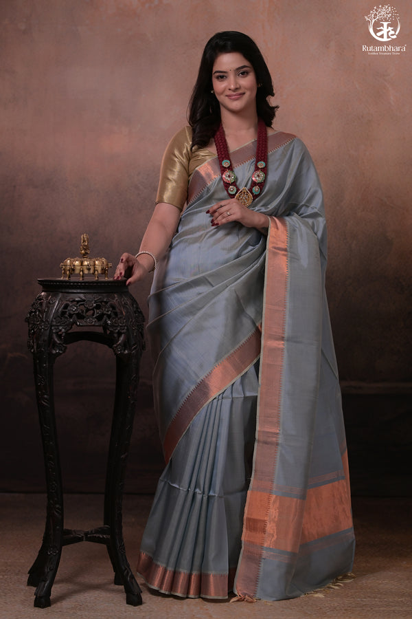 Bhadra - Powder Blue Plain Handwoven Silk Saree With Copper Zari Border-Rutambhara-RUTAMBHARA