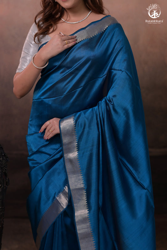 Bhadra - Indigo Blue Plain Handwoven Silk Saree With Silver Zari Border