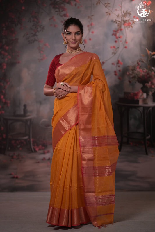 NARMAA - ORANGE ZARI TISSUE WITH PINK SELVEDGE AND GOLD ZARI CHATAI BORDER