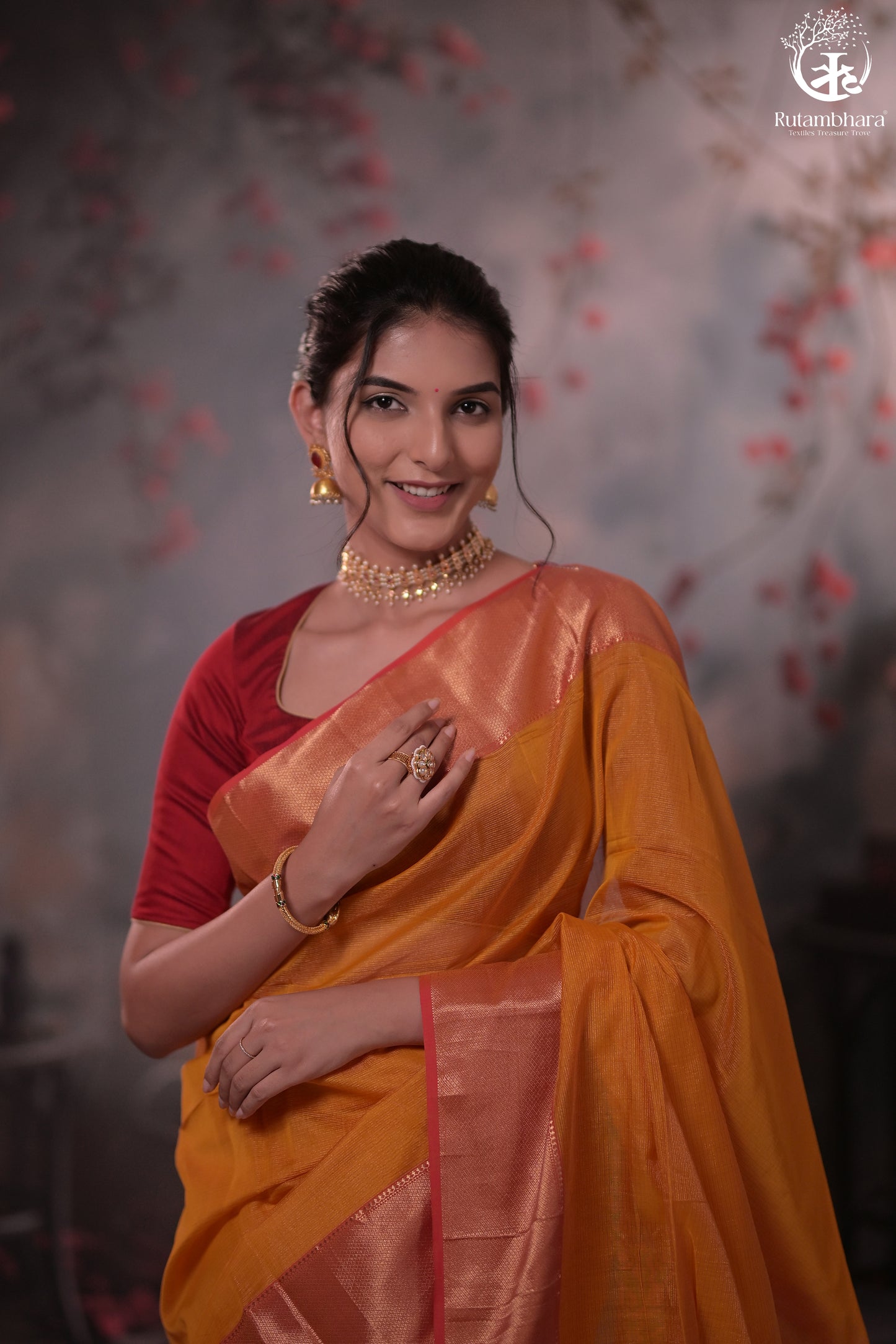 NARMAA - ORANGE ZARI TISSUE WITH PINK SELVEDGE AND GOLD ZARI CHATAI BORDER