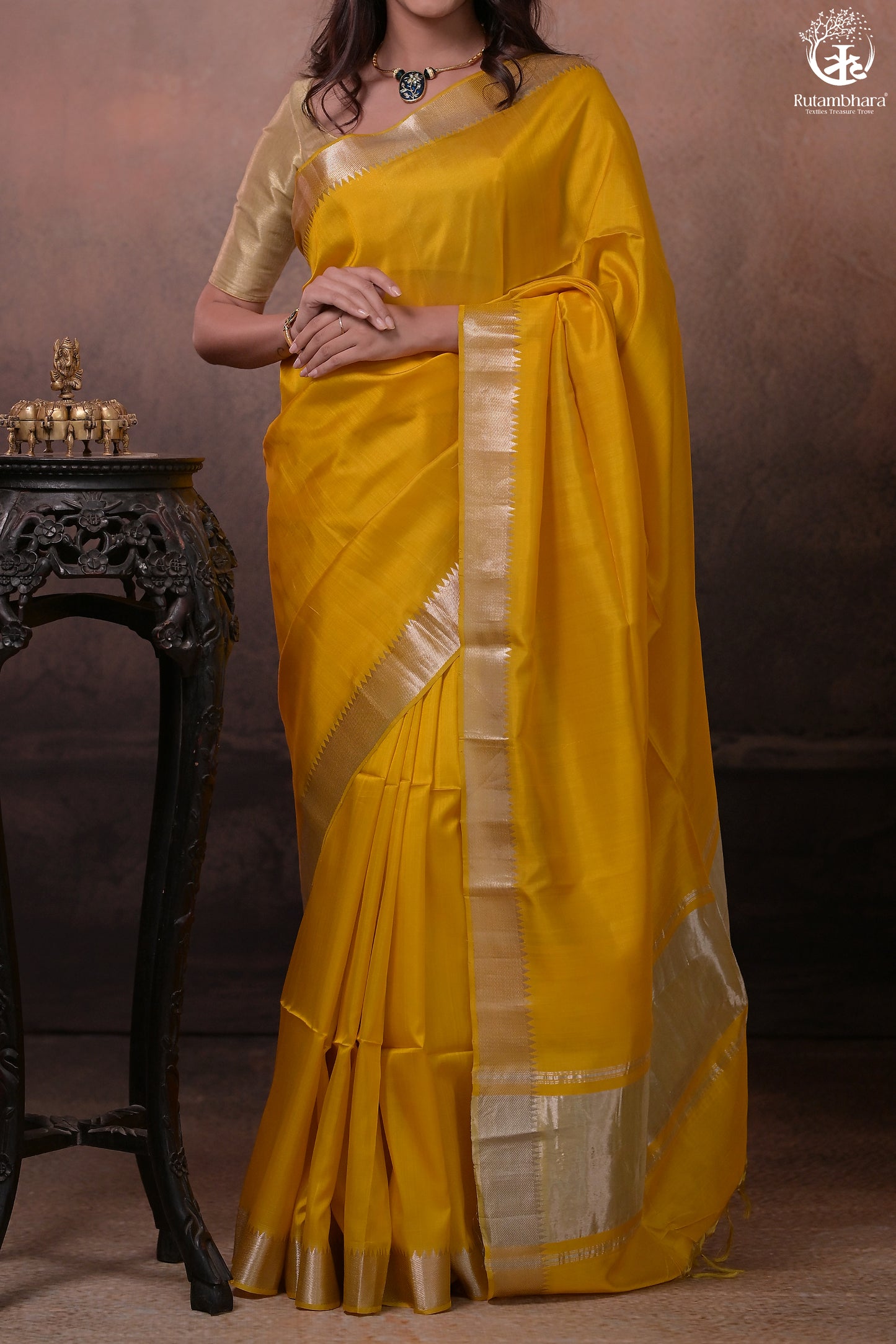 Bhadra - Turmeric Yellow Plain Handwoven Silk Saree With Silver Zari Border