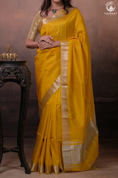 Bhadra - Turmeric Yellow Plain Handwoven Silk Saree With Silver Zari Border-Rutambhara-RUTAMBHARA
