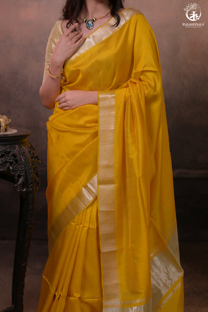 Bhadra - Turmeric Yellow Plain Handwoven Silk Saree With Silver Zari Border-Rutambhara-RUTAMBHARA