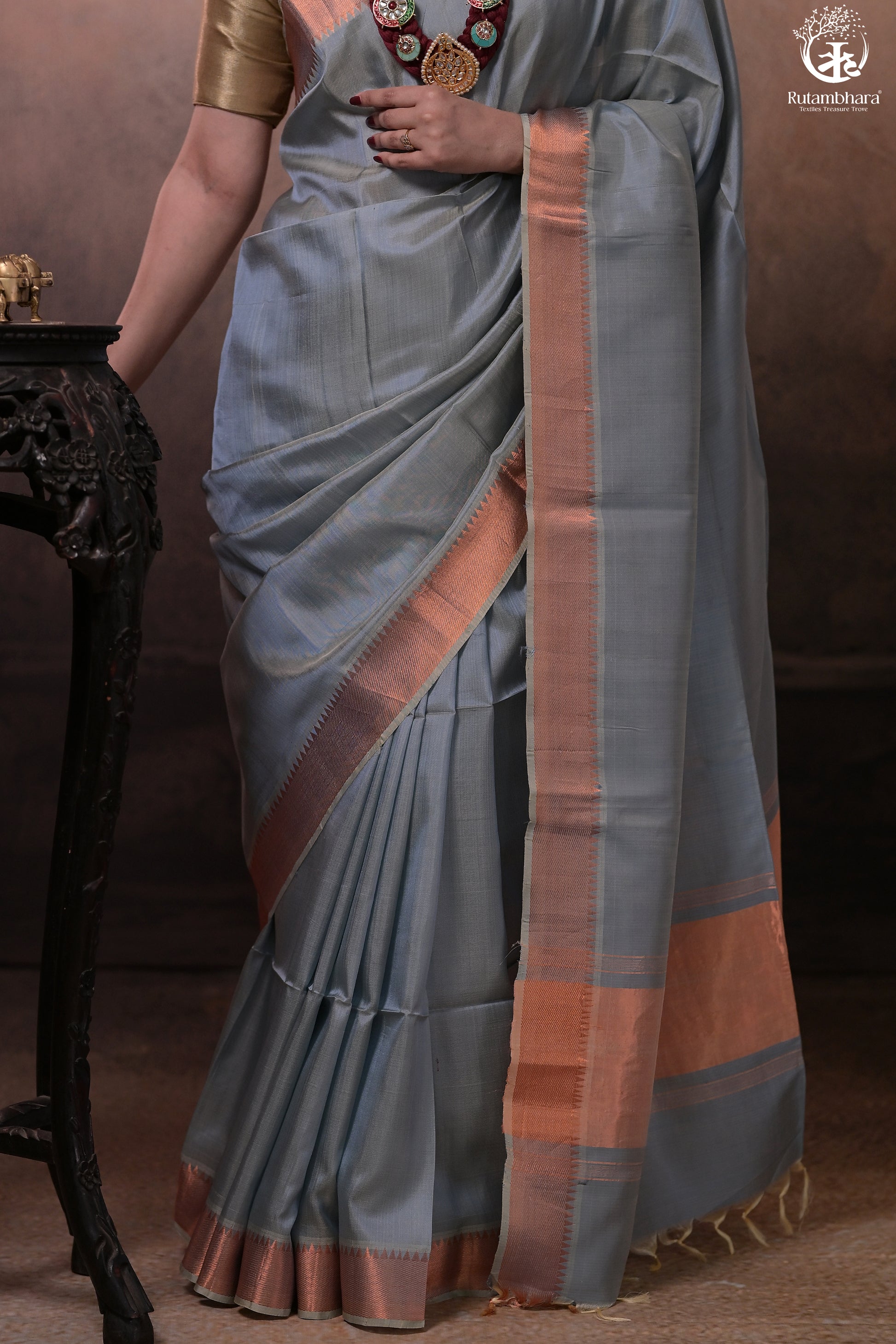 Bhadra - Powder Blue Plain Handwoven Silk Saree With Copper Zari Border-Rutambhara-RUTAMBHARA