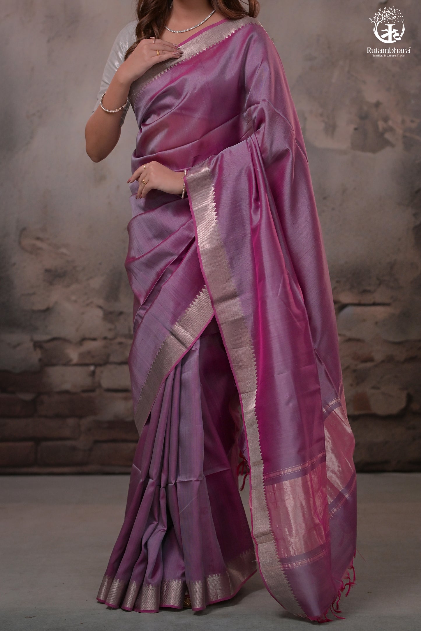 Bhadra - Pinkish Purple Plain Handwoven Silk Saree With Silver Zari Border