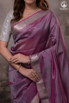 Bhadra - Pinkish Purple Plain Handwoven Silk Saree With Silver Zari Border