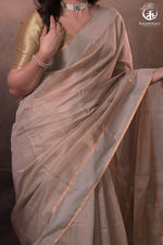 Swarvi - Pastel Beige Two Taar Chanderi Tissue Saree with Powder Blue Selvedge-RUTAMBHARA -RUTAMBHARA