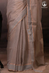 Swarvi - Pastel Beige Two Taar Chanderi Tissue Saree with Powder Blue Selvedge