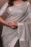 Narmaa - Pastel Grey And Silver Tissue Silk Cotton Saree With Extra Weft Silver Zari Butta
