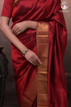 Bhadra - Reddish Maroon Plain Handwoven Silk Saree With Gold Zari Border