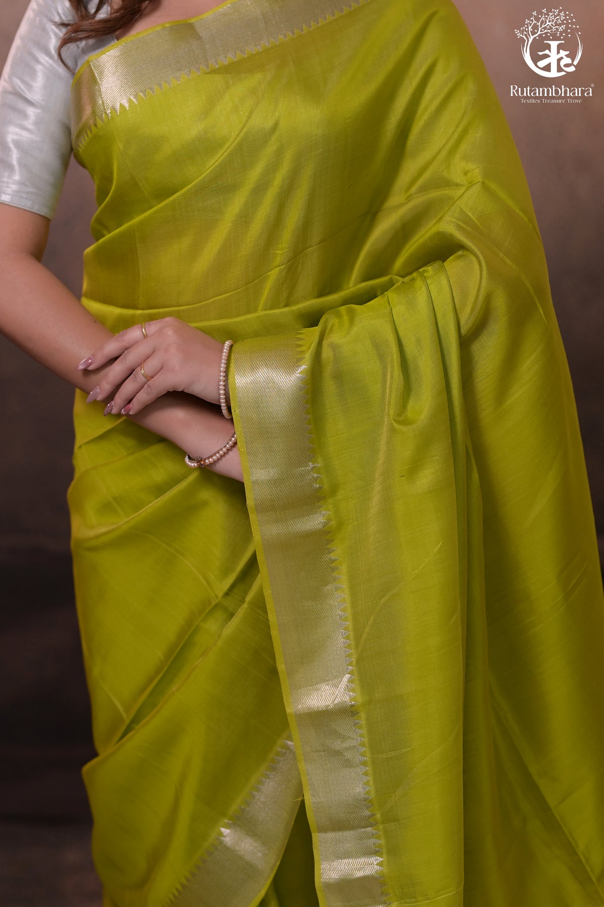 Bhadra - Lemon Green  Plain Handwoven Silk Saree With Silver Zari Border