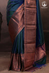 Bhadra - Teal Blue Plain Handwoven Silk Saree With Copper Zari Border