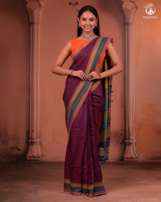 JESAAL - Elegant Handloom Cotton Saree In Plumb With Vibrant Kutchhi Pallu.