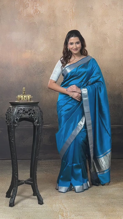 Bhadra - Indigo Blue Plain Handwoven Silk Saree With Silver Zari Border