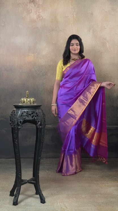 Bhadra - Lavender Pink Plain Handwoven Silk Saree With Gold Zari Border